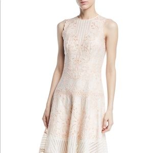 Intricate fit and flare embroidered dress
